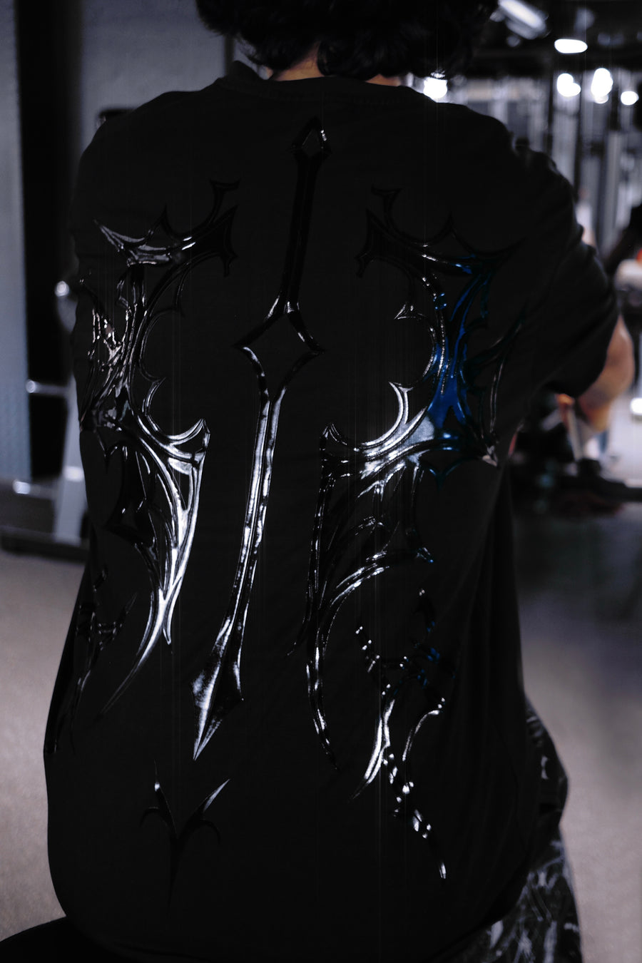 Requiem Tee Midnight, close-up of the raised DARK ICHOR silicone on the back