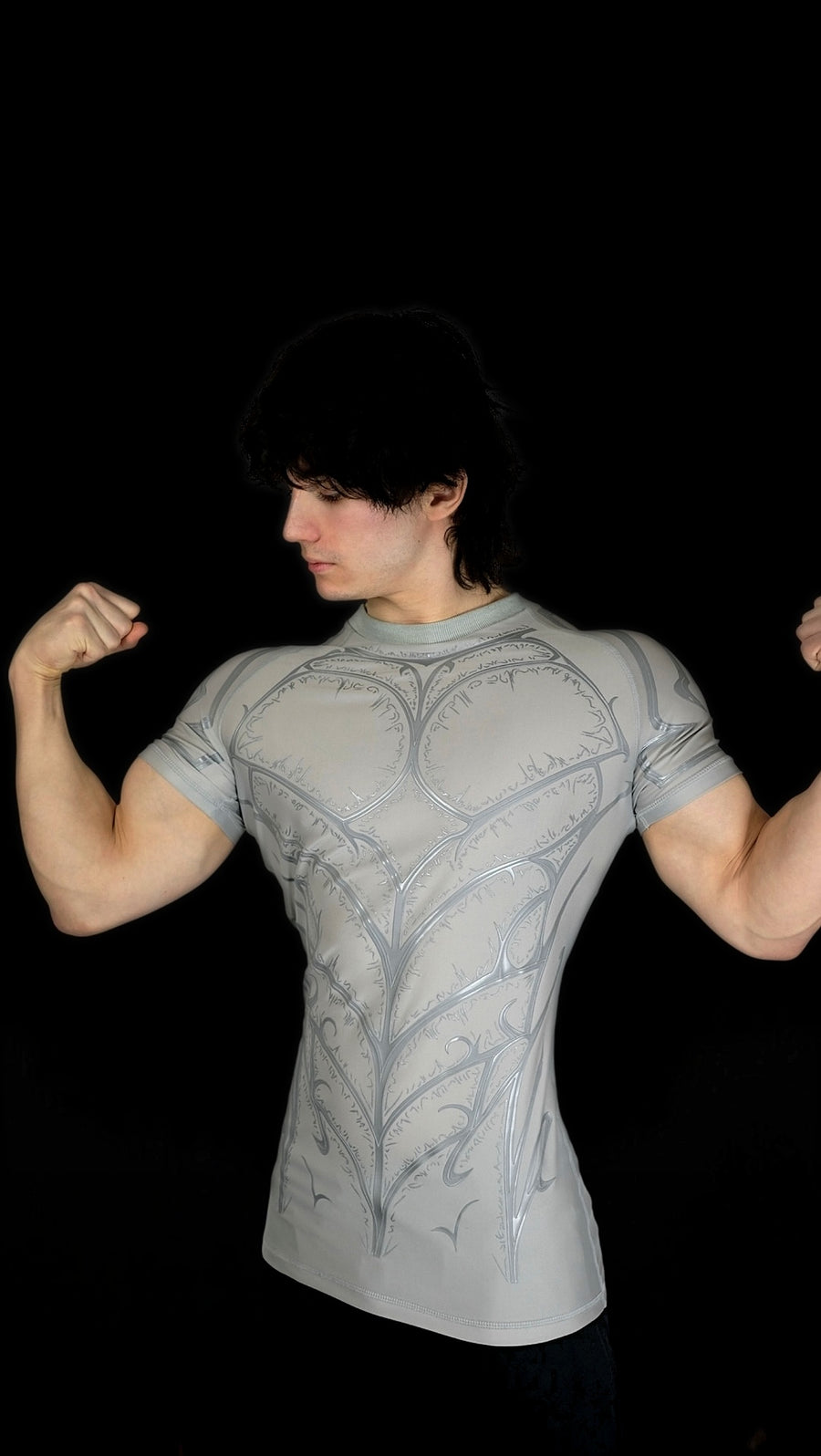 Knight Compression Angel worn in a flex pose, short sleeves covering the shoulder