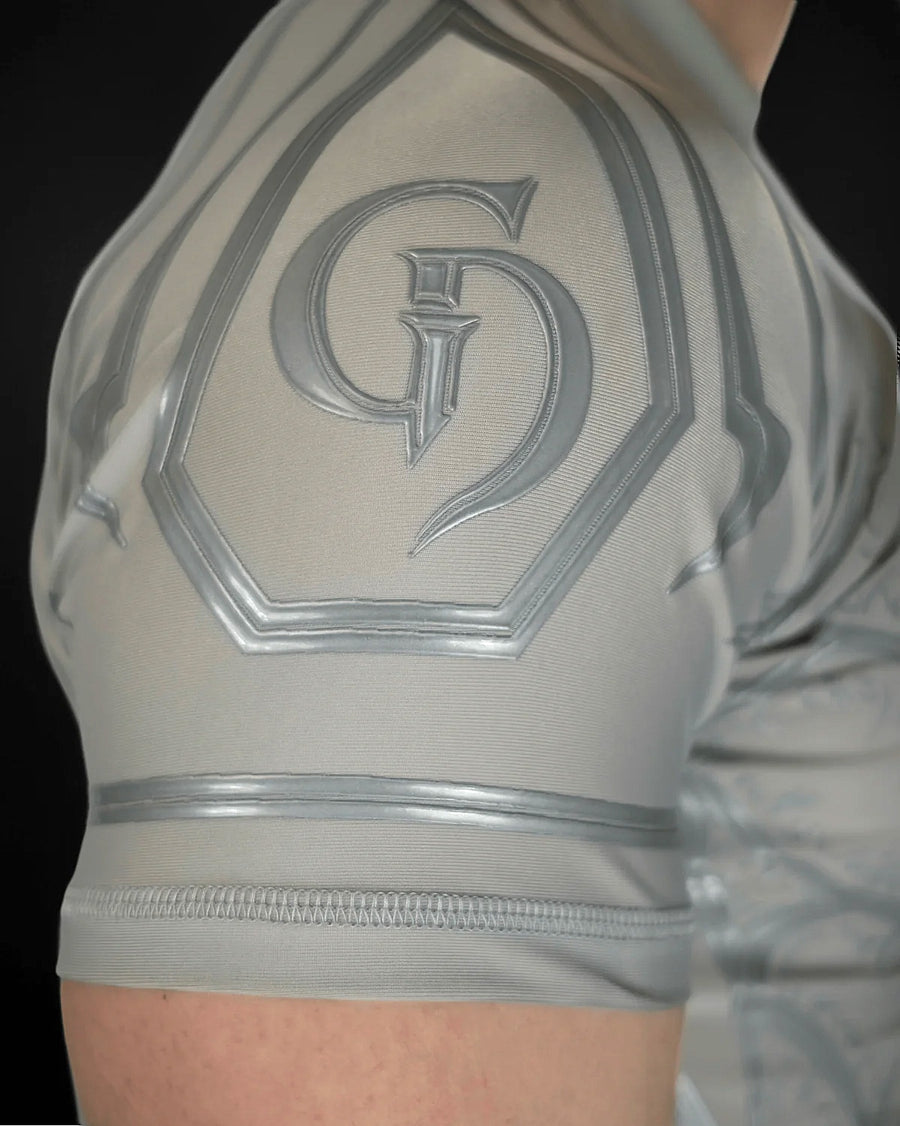 Knight Compression Angel, close-up of the GD emblem on the shoulder in grey silicone